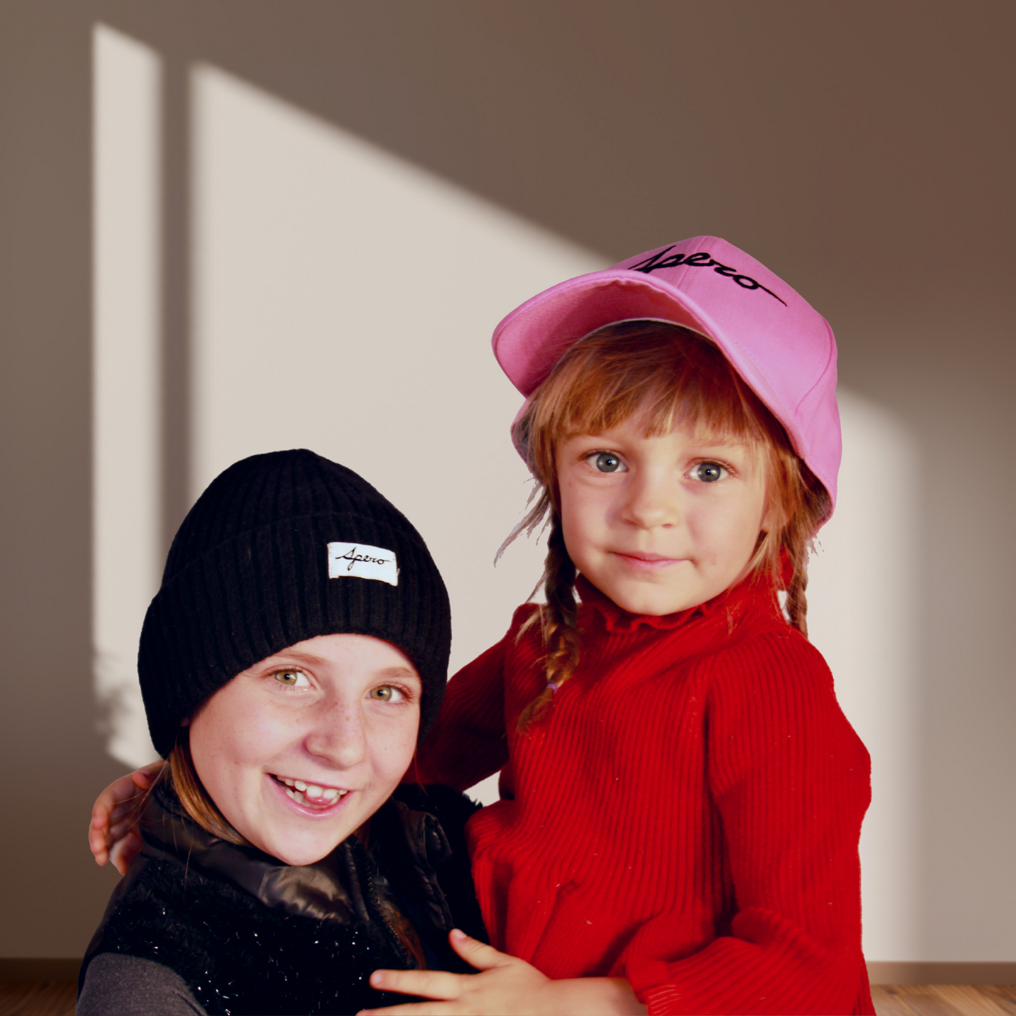 Children wearing EMF protection beanie and cap, blocking harmful radiation and protecting growing brains.